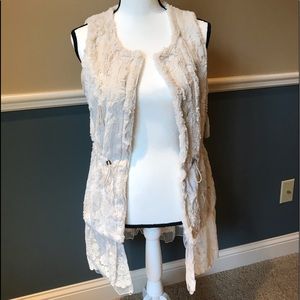 Alter’d State furry vest.